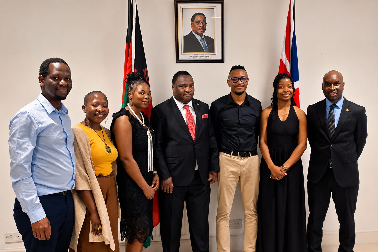 Dr Bisika flanked by the Chevening Scholars